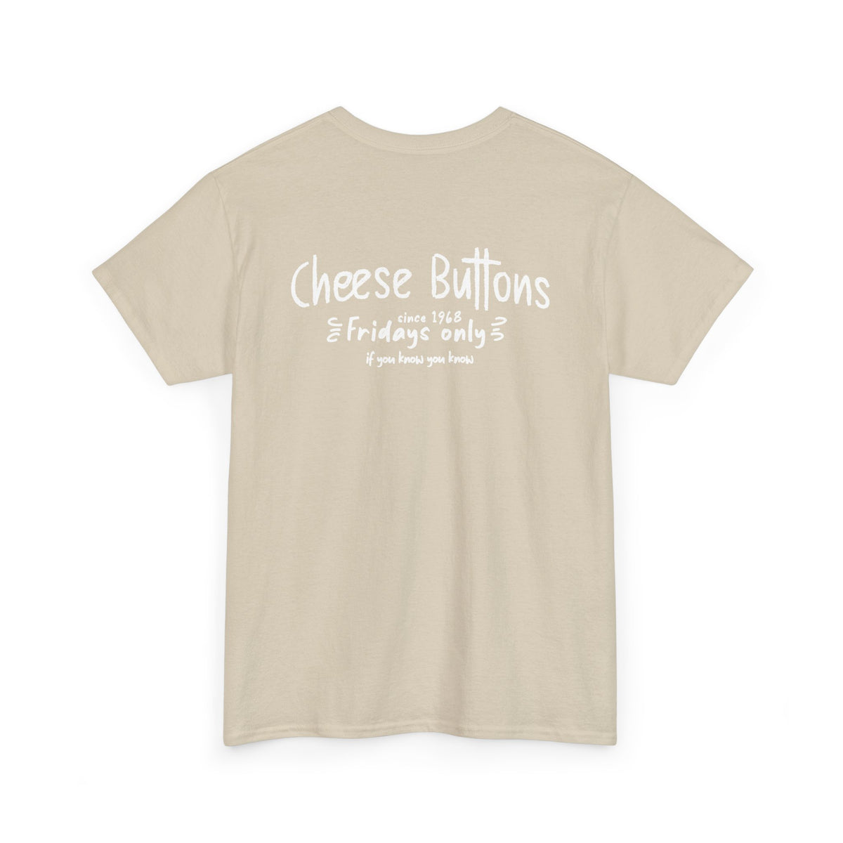 Back of the sand White House Cafeteria T-shirt with a white Cheese Buttons graphic recalling the restaurant's Friday menu tradition. The warm neutral shirt celebrates favorite meals and memories from the Bismarck cafe.