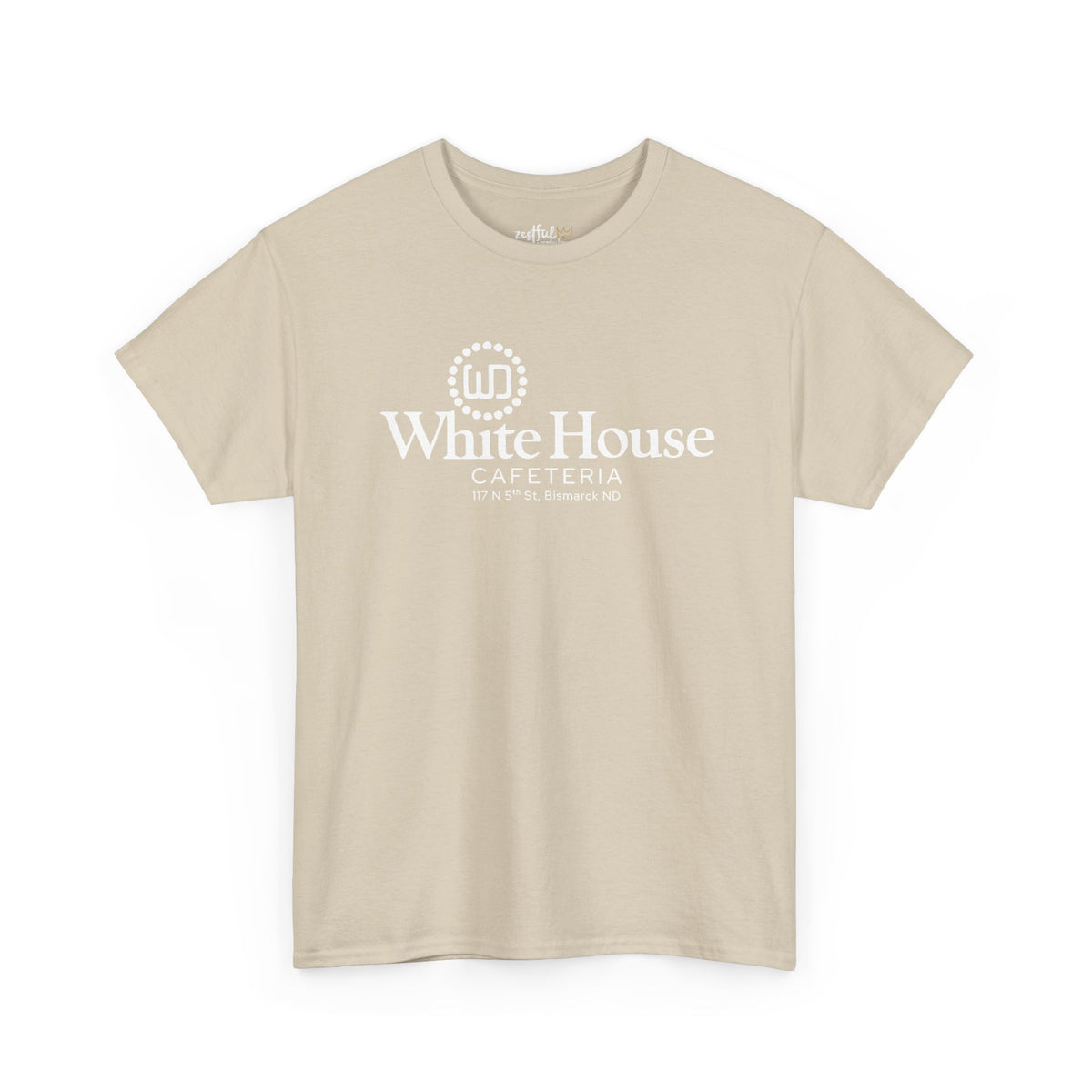 Sand-colored White House Cafeteria short-sleeve T-shirt shown from the front with the historic restaurant logo printed in white on the chest. A neutral commemorative shirt inspired by the longtime Bismarck, North Dakota cafe.