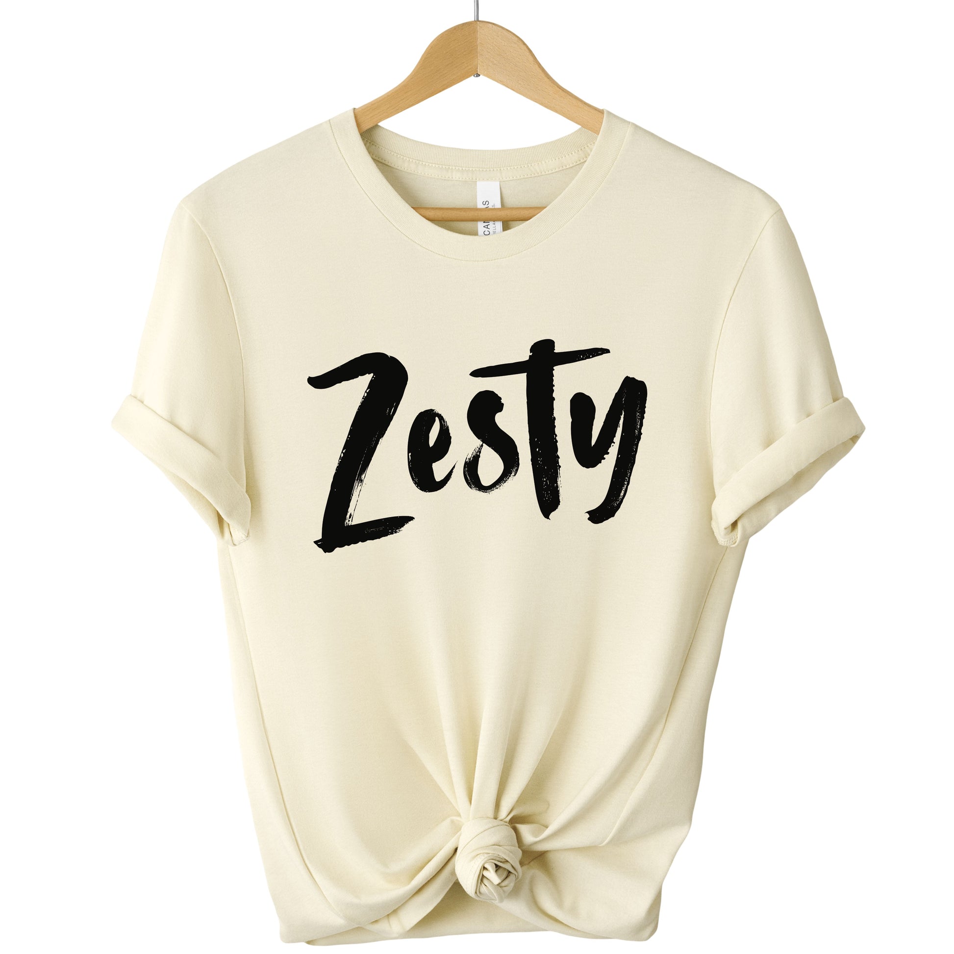 Cream Zesty Statement Tee with relaxed fit and bold script design